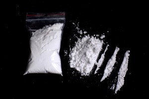 Cocaine drug powder pile, lines and bag